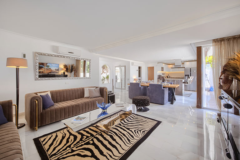 View from the living room into the dining area and the open kitchen